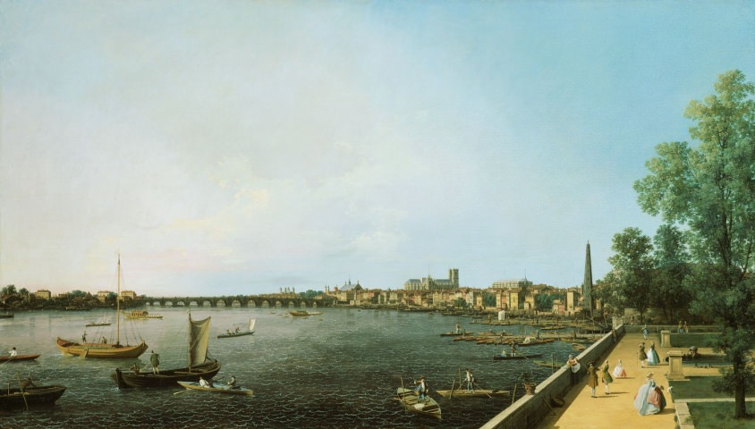 Painting. A sweeping view includes a river with a long, arched bridge across it. The setting sun warms the sky to coral pink along the horizon to our left. Dozens of rowboats and sailboats are in the river and tied along the riverbank. Westminster Abbey and Westminster Hall rise high above the surrounding buildings in the distance.